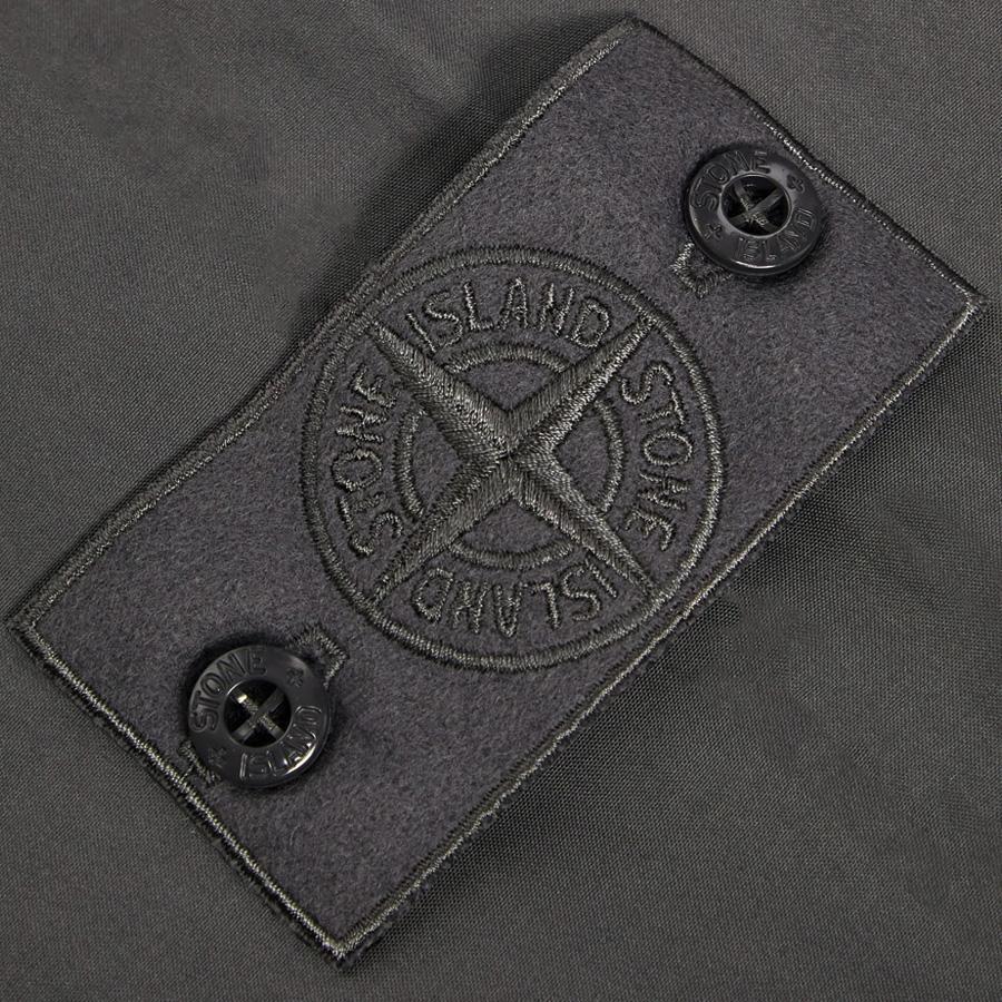 Stone Island Ghost Flannel Loose Fit Trousers with Elasticated Zipped Cuffs in Dark GreyTrousersStone IslandDPUS Designer Outlet805381348634128Stone Island Ghost Flannel Loose Fit Trousers with Elasticated Zipped Cuffs in Dark Grey