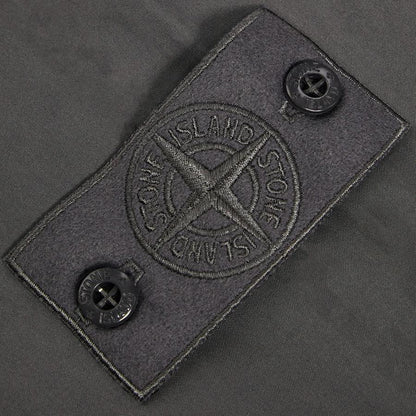 Stone Island Ghost Flannel Loose Fit Trousers with Elasticated Zipped Cuffs in Dark GreyTrousersStone IslandDPUS Designer Outlet805381348634128Stone Island Ghost Flannel Loose Fit Trousers with Elasticated Zipped Cuffs in Dark Grey