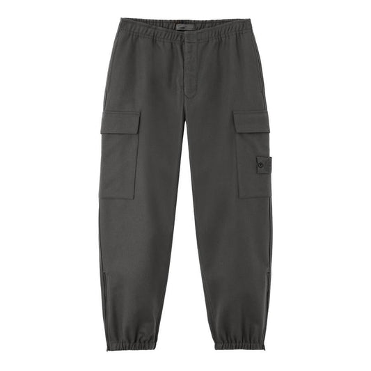 Stone Island Ghost Flannel Loose Fit Trousers with Elasticated Zipped Cuffs in Dark GreyTrousersStone IslandDPUS Designer Outlet805381348634128Stone Island Ghost Flannel Loose Fit Trousers with Elasticated Zipped Cuffs in Dark Grey