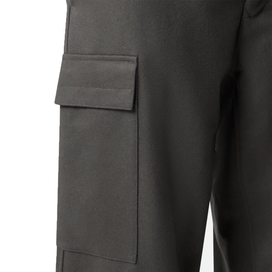 Stone Island Ghost Flannel Loose Fit Trousers with Elasticated Zipped Cuffs in Dark GreyTrousersStone IslandDPUS Designer Outlet805381348634128Stone Island Ghost Flannel Loose Fit Trousers with Elasticated Zipped Cuffs in Dark Grey