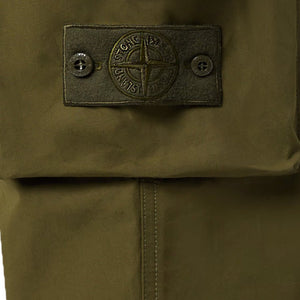 Stone Island Ghost Weatherproof Cotton Canvas Cargo Trousers in Military GreenTrousersStone IslandDPUS30Stone Island Ghost Weatherproof Cotton Canvas Cargo Trousers in Military Green