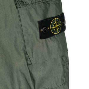 Stone Island Junior Cotton/ Polyester Cargo Trousers in Olive GreenTrousersStone Island JuniorDPUS80525728673098Stone Island Junior Cotton/ Polyester Cargo Trousers in Olive Green