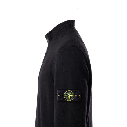 Stone Island black lambswool half-zip sweater side profile with compass badge.