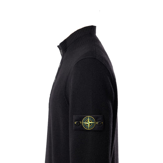 Stone Island black lambswool half-zip sweater side profile with compass badge.