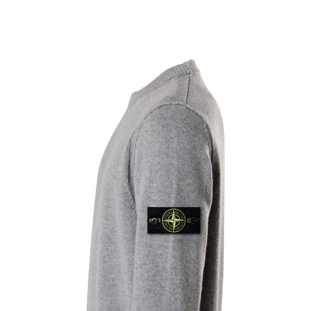 Stone Island grey melange wool crewneck sweater side profile with compass badge.