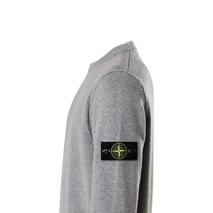 Stone Island grey melange wool crewneck sweater side profile with compass badge.