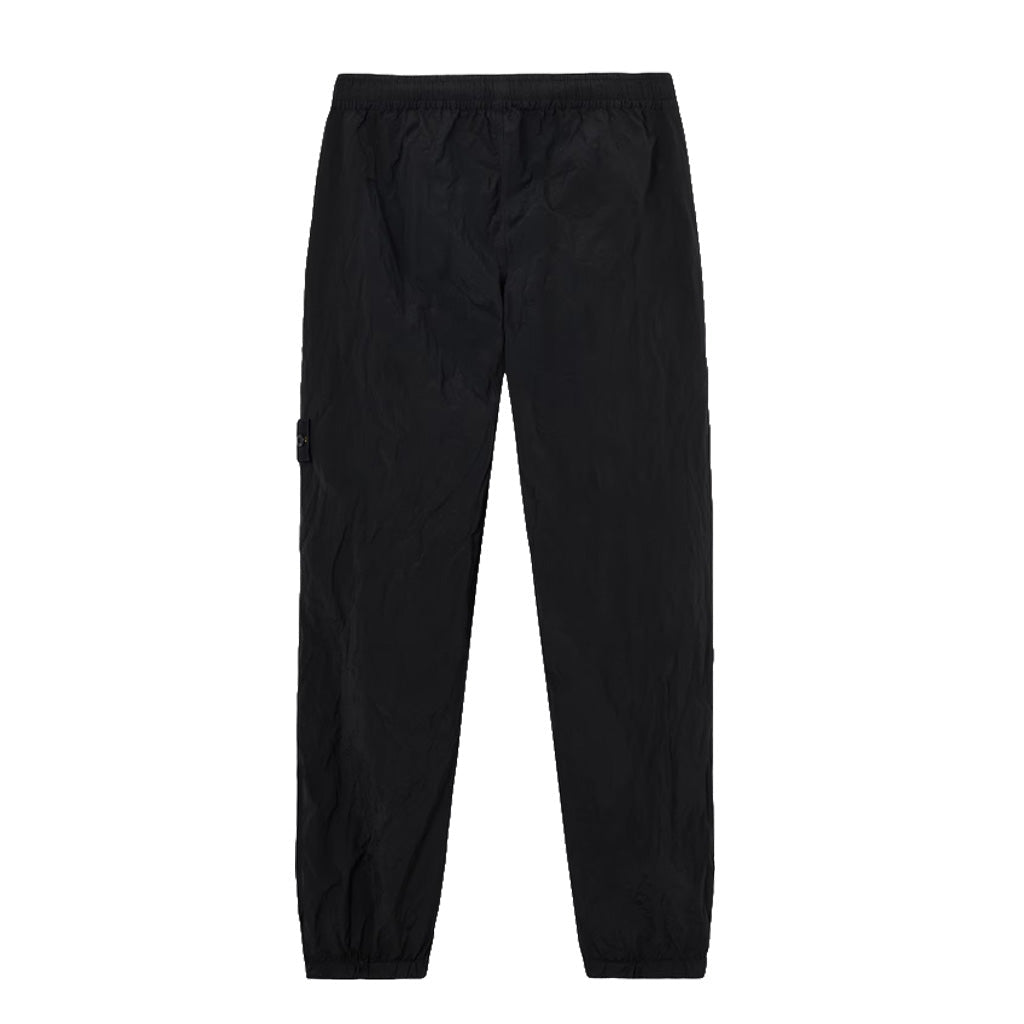 Stone Island black Nylon Metal Econyl crinkled trousers full front view showing elasticated waist and cuffs.