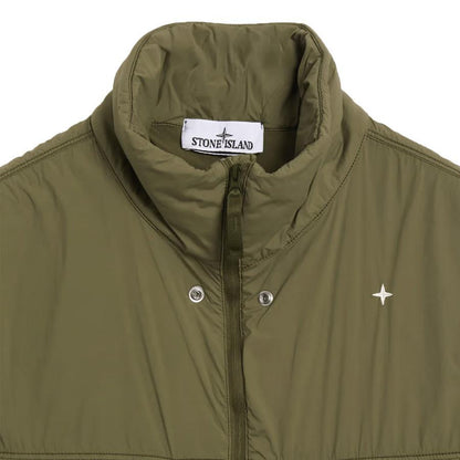 Stone Island Stellina Skin Touch Nylon - TC Vest in Olive GreenCoats & JacketsStone IslandDPUS Designer Outlet8053813486464SStone Island Stellina Skin Touch Nylon - TC Vest in Olive Green