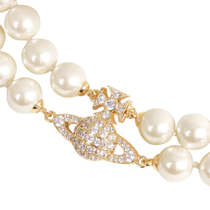 Vivienne Westwood Graziella Pearl Bracelet in Gold / Creamrose Pearl / White CzJewelleryVivienne WestwoodDPUS Designer Outlet8053195071524W1Vivienne Westwood Graziella Pearl Bracelet in Gold / Creamrose Pearl / White Cz