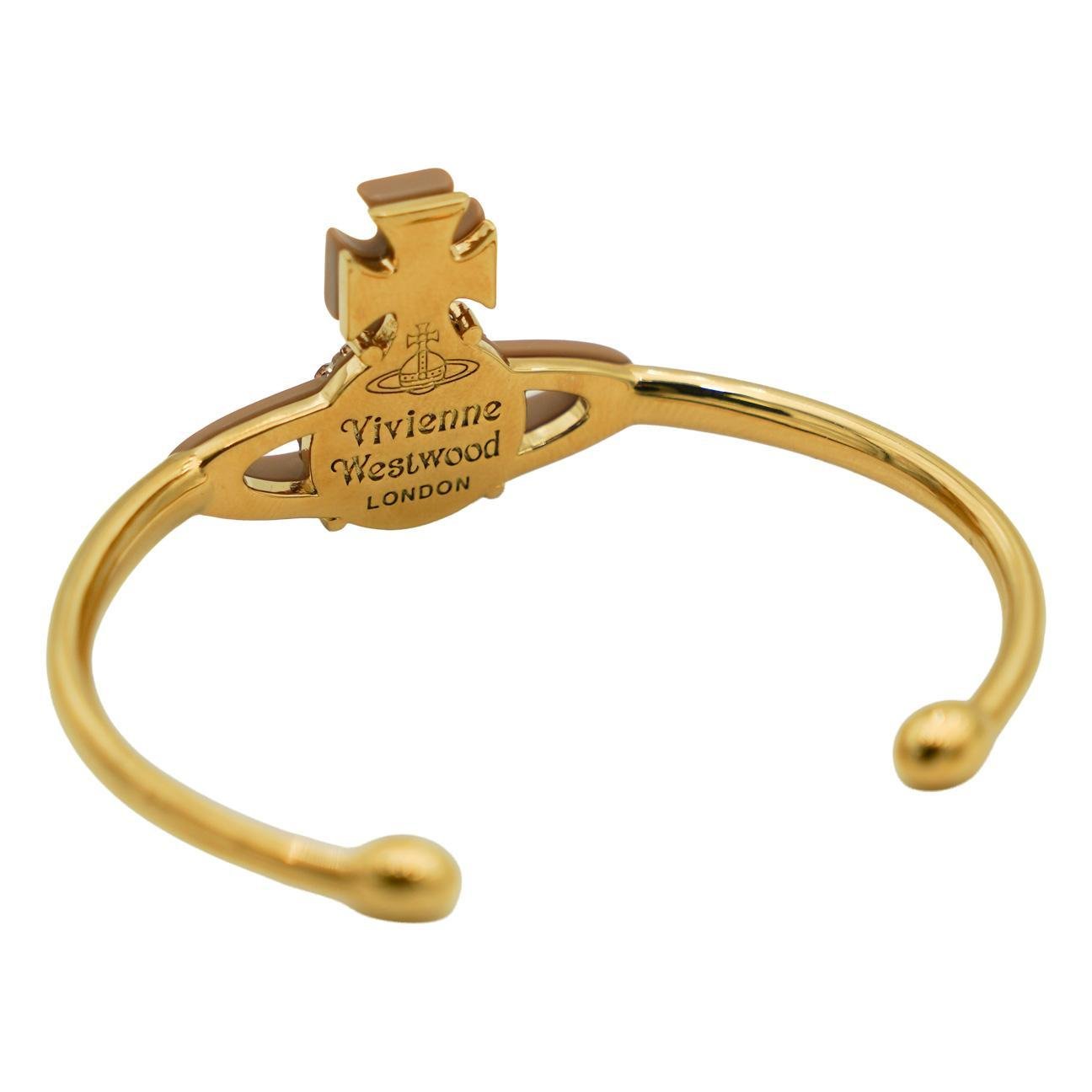 Vivienne Westwood Pop Orb Bangle in Gold/Light Colorado Topaz Crystal/LightJewelleryVivienne WestwoodDPUS Designer OutletVivienne Westwood Pop Orb Bangle in Gold/Light Colorado Topaz Crystal/Light