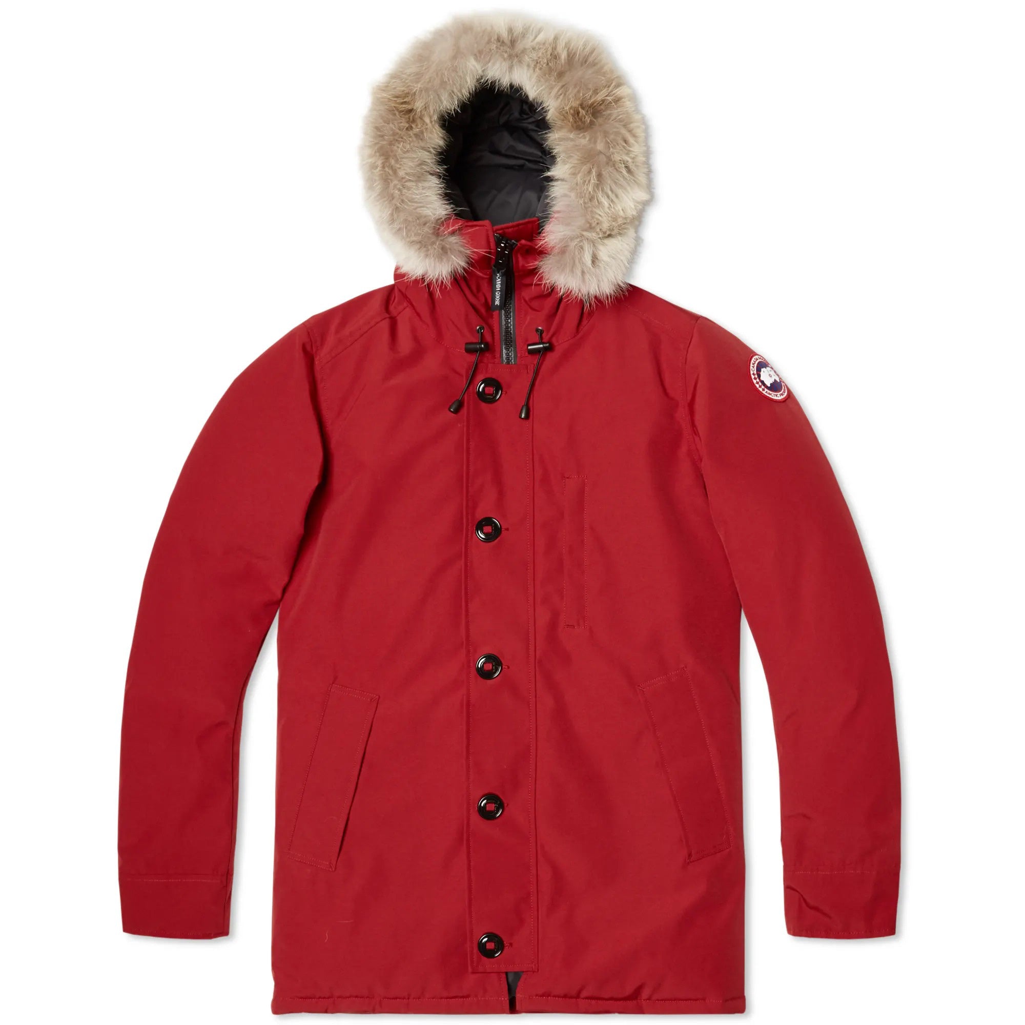 Stay warm and stylish in the Canada Goose Chateau Parka. This parka features a red maple Arctic-Tech shell that is water-resistant and padded for added warmth. The detachable drawstring hood and coyote fur trim provide extra protection against the elements, while the fleece-lined chin guard adds comfort. The dropped shoulders, zipped chest pocket, and side slip pockets offer practical storage options.