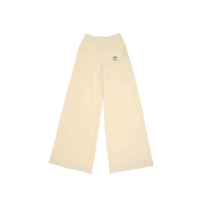Add some luxe to your casual wardrobe with these Palm Angels track pants. Made from a soft chenille fabric in a crisp off-white shade, these pants are a stylish choice for any occasion. The elasticated waistband and wide leg silhouette provide a comfortable fit, while the logo patch to the side adds a touch of branding. Made from a blend of polyester, viscose, and cotton, these pants are both stylish and comfortable.