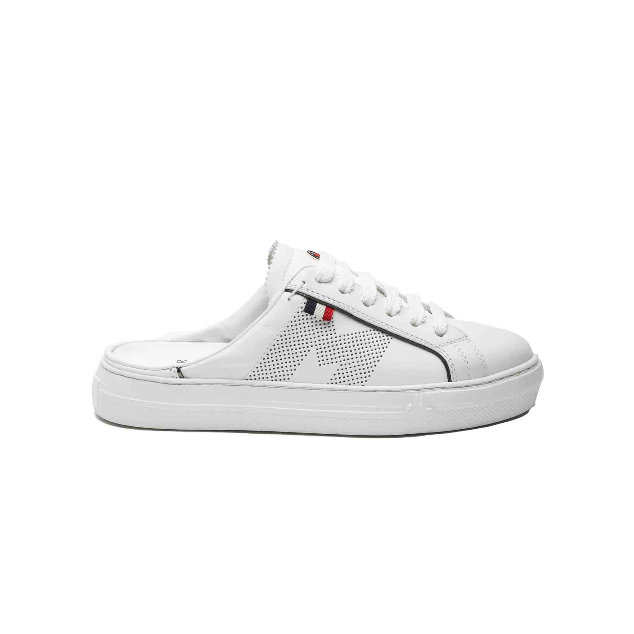 Classic Moncler Ariel sneaker has been given a summer face lift. Crafted from leather these are ideal for sitting around the pool or walking through the city. Moncler logo to the tongue with tri-colour tab to the side. Large perforated 